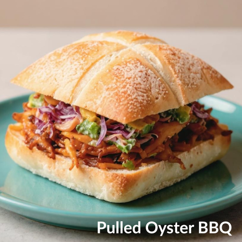 Pulled Oyster BBQ sandwich on a blue plate with a beige background