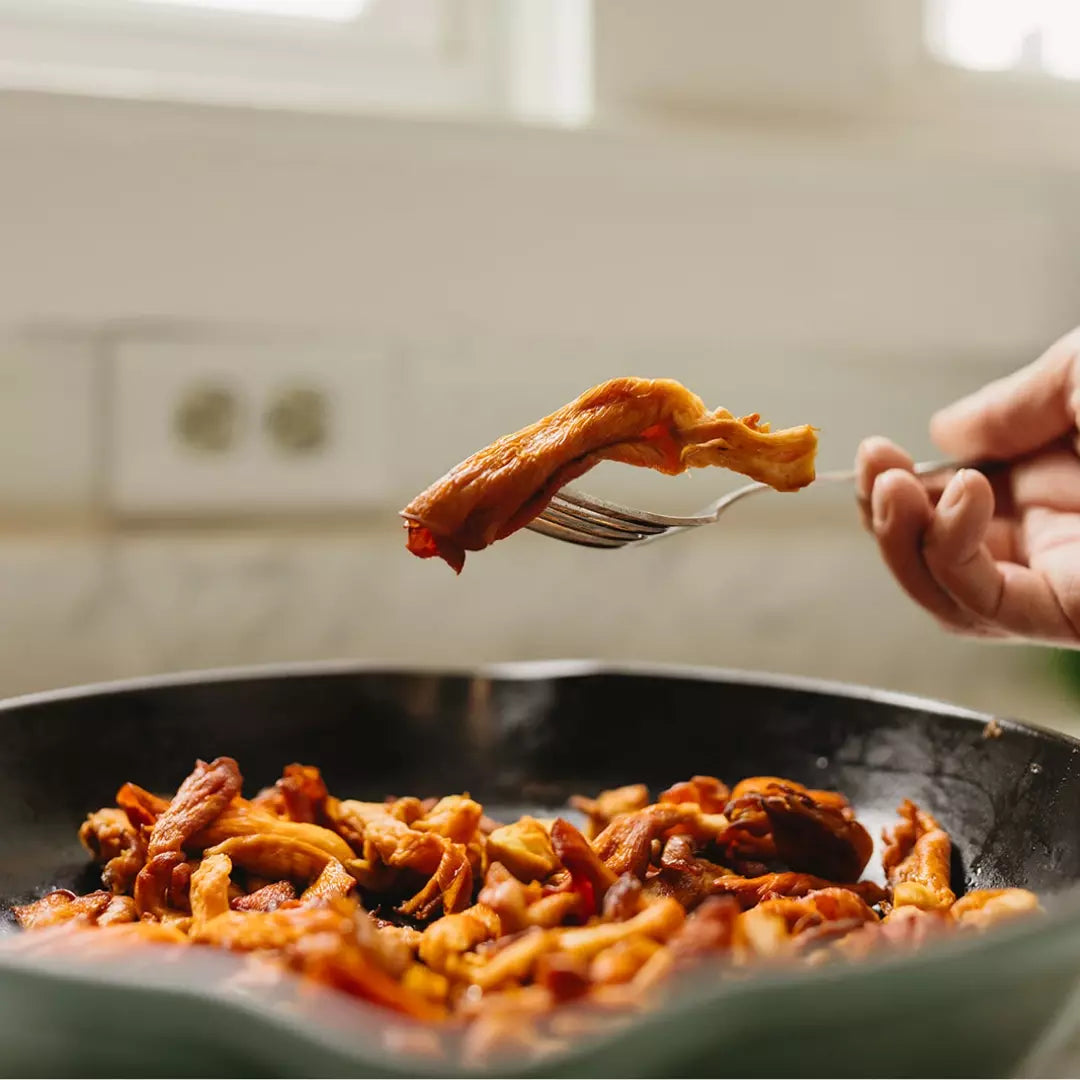 Sautéed Mushrooms from Home Grow Kit: Golden Caramelized Gourmet Mushrooms on Fork - Chef-Quality Kitchen