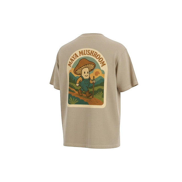 Maya Mushroom sand colored heavyweight 100% cotton t-shirt with oversized fit and drop shoulder. Features a graphic of a mushroom character hiking.